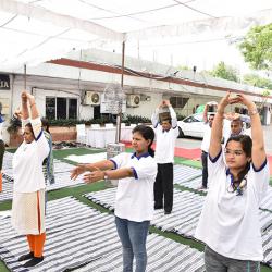 Children enjoying demo of hand print technology in Science Express Climate Action Special 